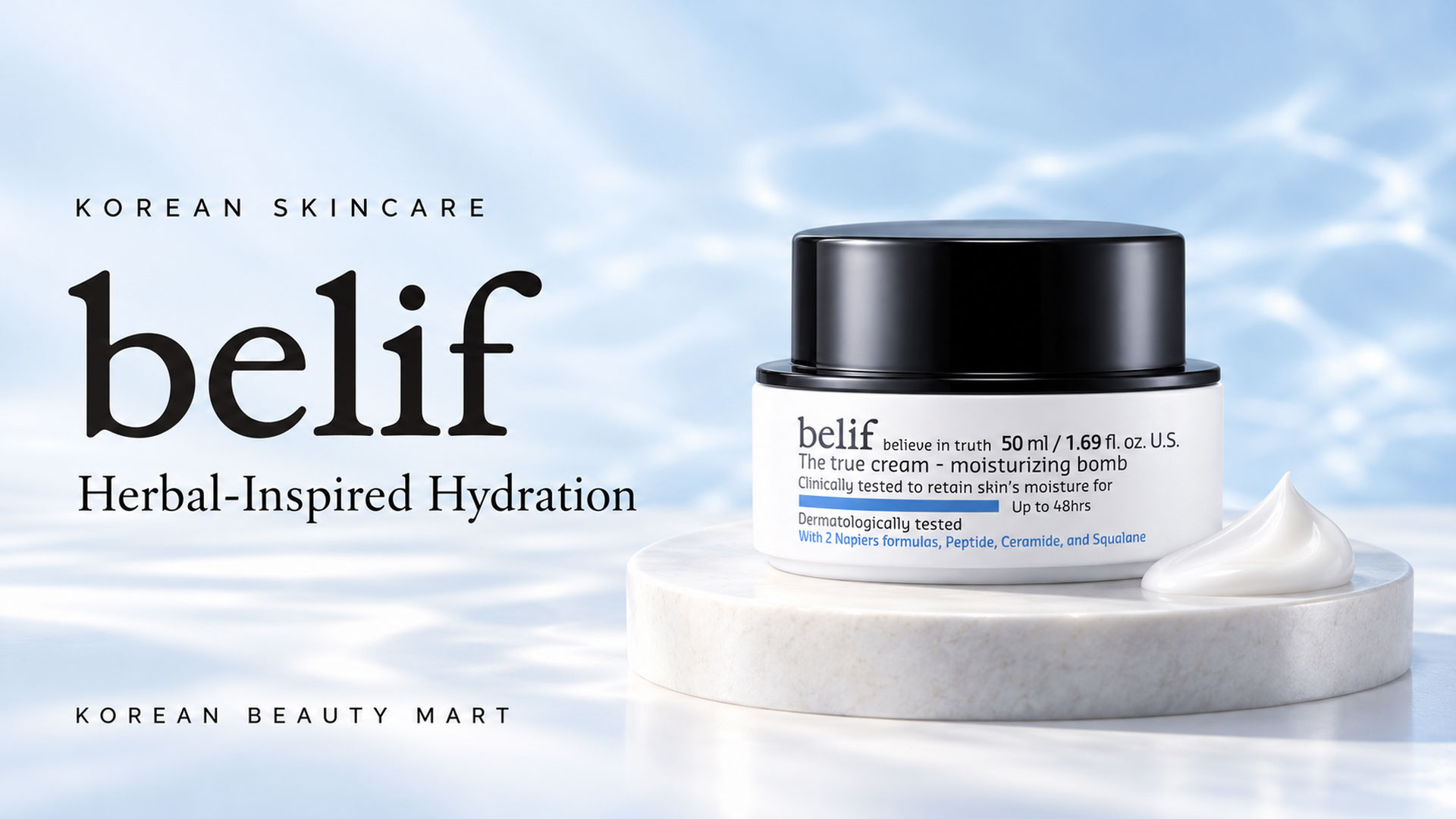 belif The True Cream Moisturizing Bomb jar with a black lid on a white platform against a pale blue background