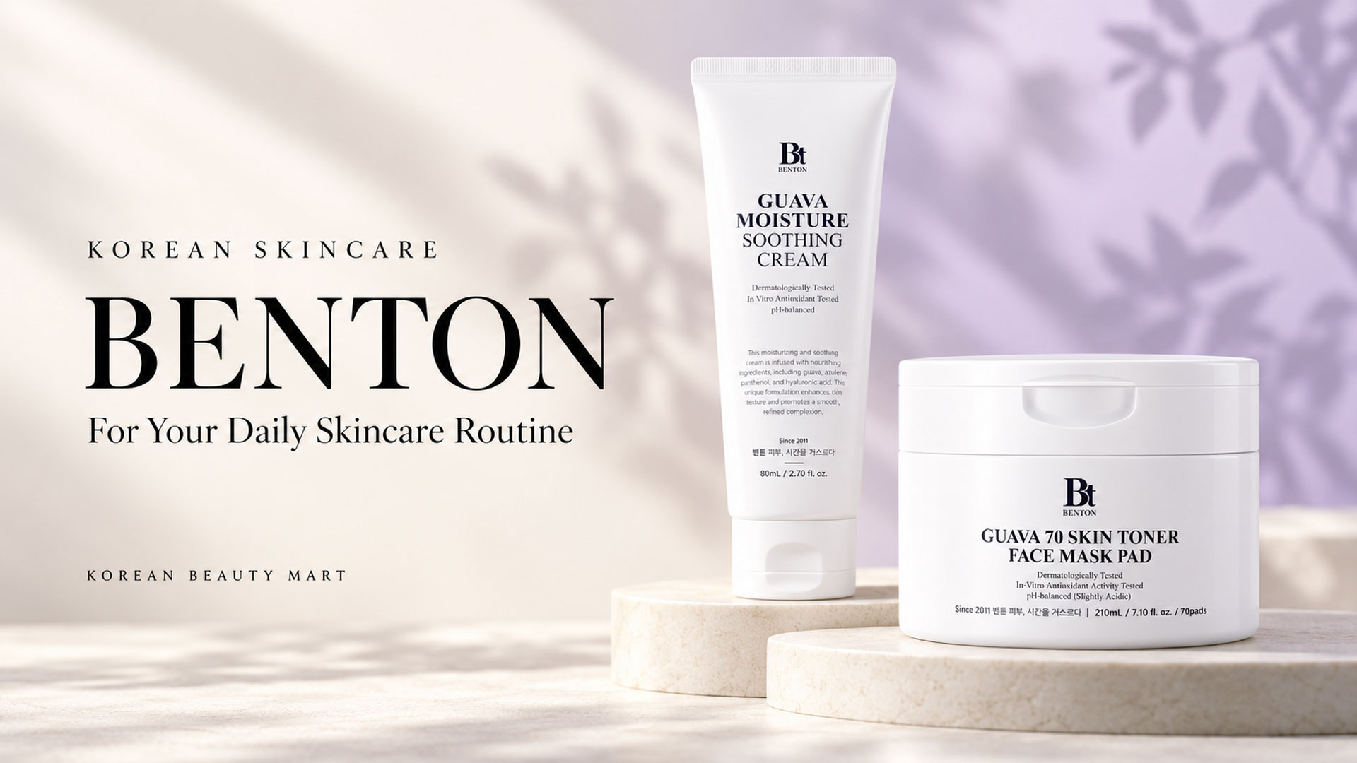 Benton Guava Moisture Soothing Cream and Guava 70 toner-pad container on an ivory display with a pale lavender background