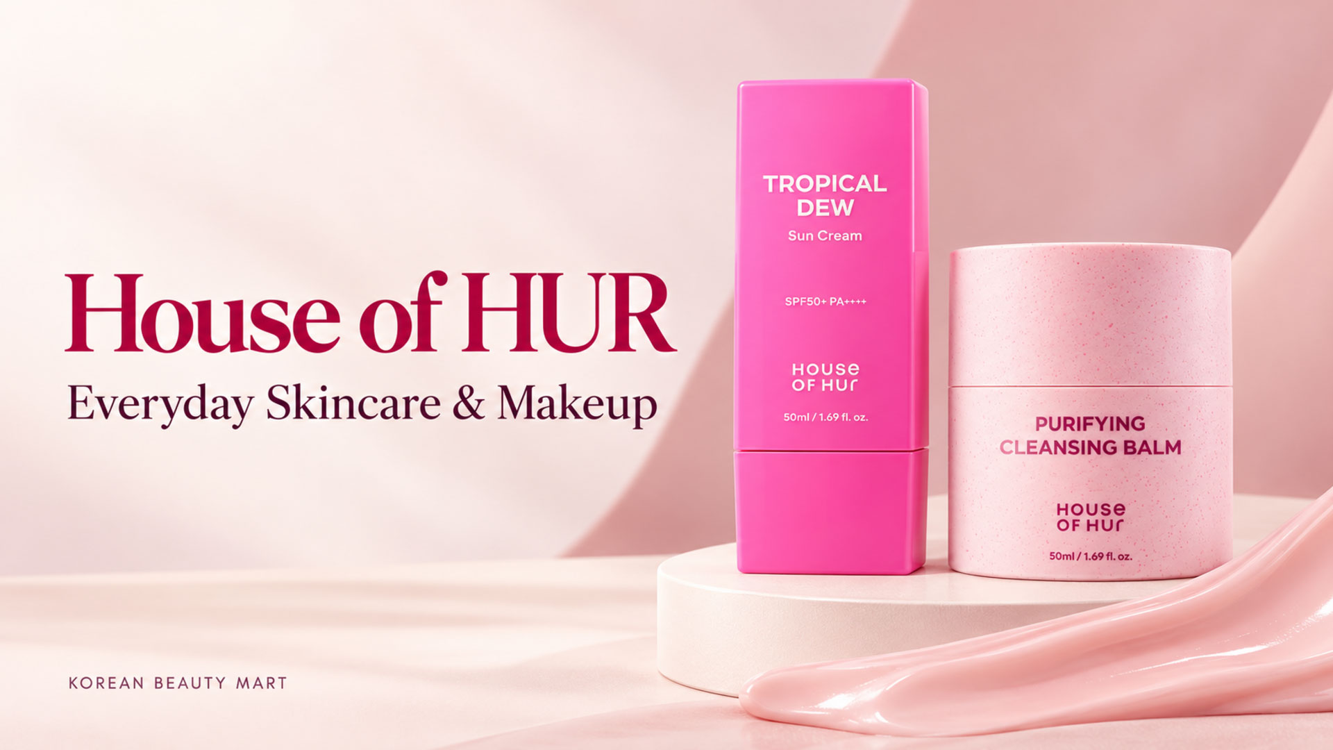 House of HUR Purifying Cleansing Balm and Tropical Dew Sun Cream in pink packaging on an ivory and blush background.
