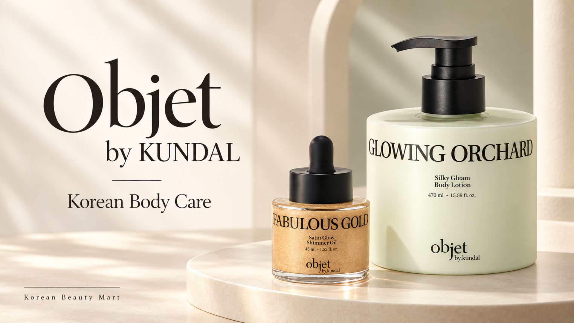 Objet by KUNDAL Glowing Orchard 470 ml body lotion and Fabulous Gold 45 ml shimmer oil on an ivory background for Korean Beauty Mart.
